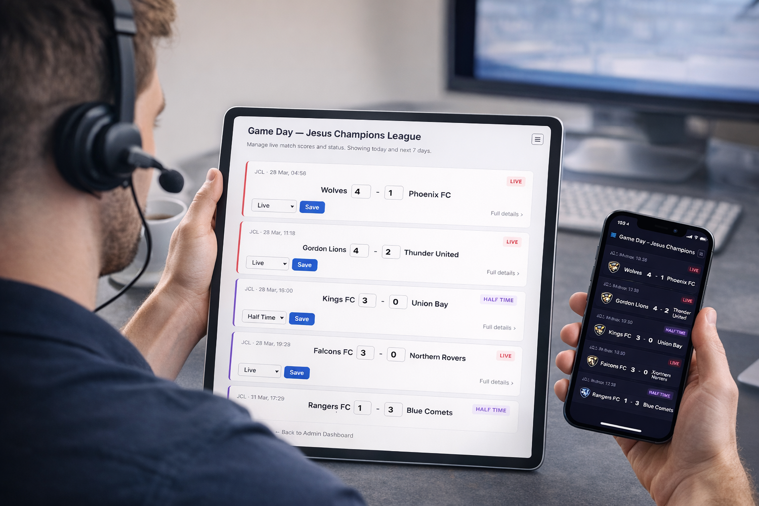 Match operator managing game day scores on tablet and phone